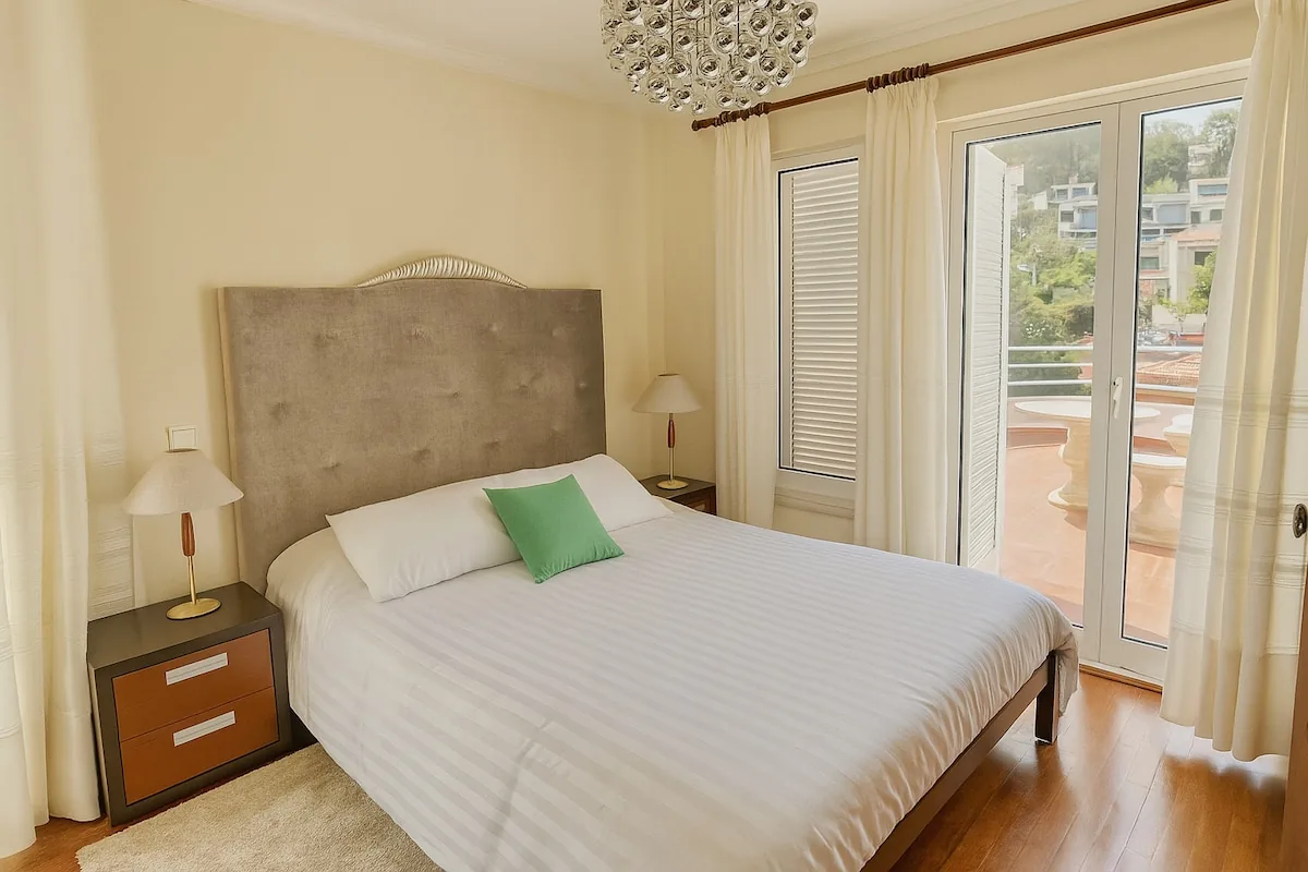 The double bed, with the terrace behind