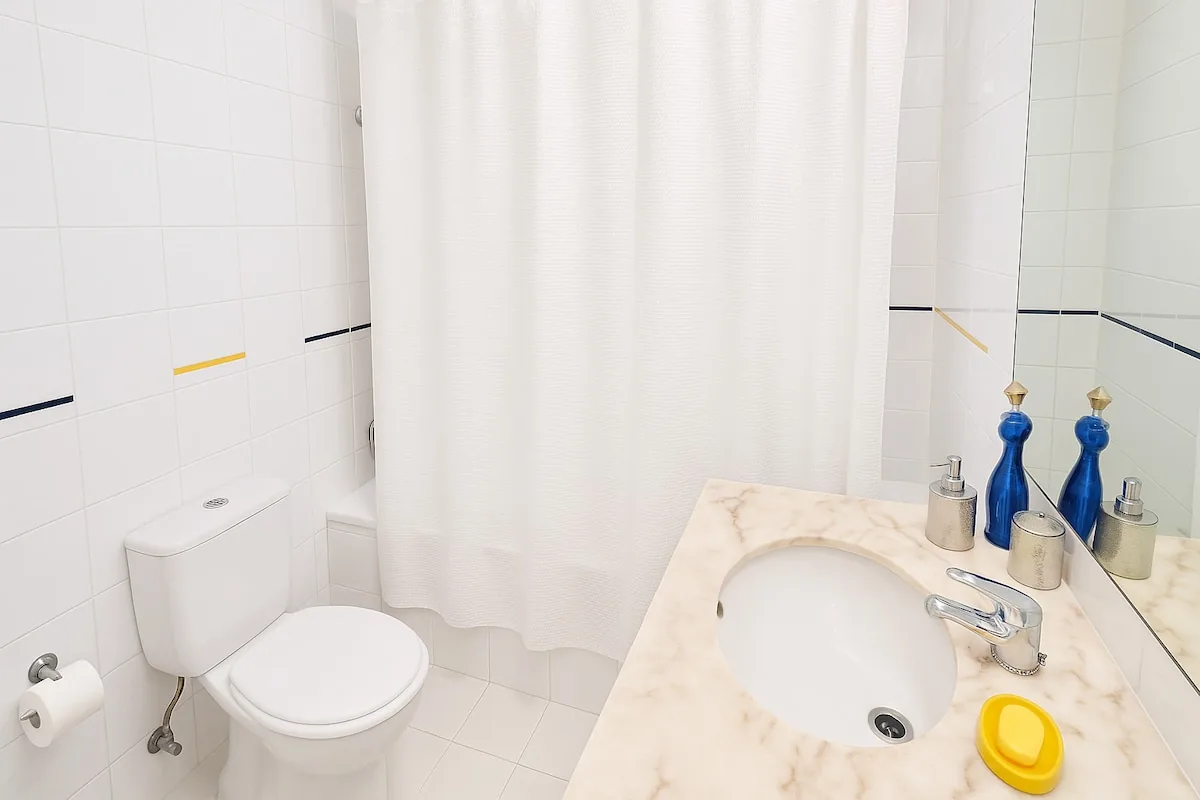 The bathroom, with a bathtub